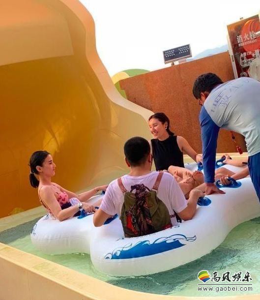 网友春节期间偶遇黄圣依与杨子家人三亚度假：她身穿粉色泳衣！身材娇美