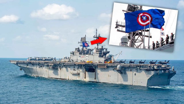 美军“美国”号两栖攻击舰上方飘起巨大旗帜《美国队长》标志性盾牌图案