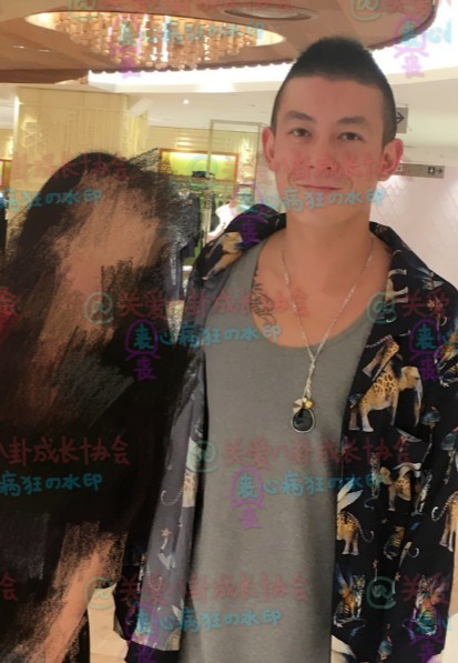 有网友曝光在日本偶遇陈冠希秦舒培的照片