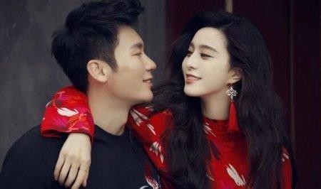 粉丝团晒出范冰冰、李晨乘扶梯照片：冰冰搂着李晨，小两口超恩爱
