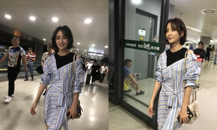 佟丽娅现身机场：蓝色条纹衬衣裙，齐肩短发显得气质出众，时尚又优雅