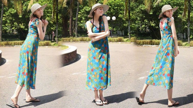 迪丽热巴晒出美图：热巴身穿蓝色斑点裙，摆出各种性感pose，青春妩媚