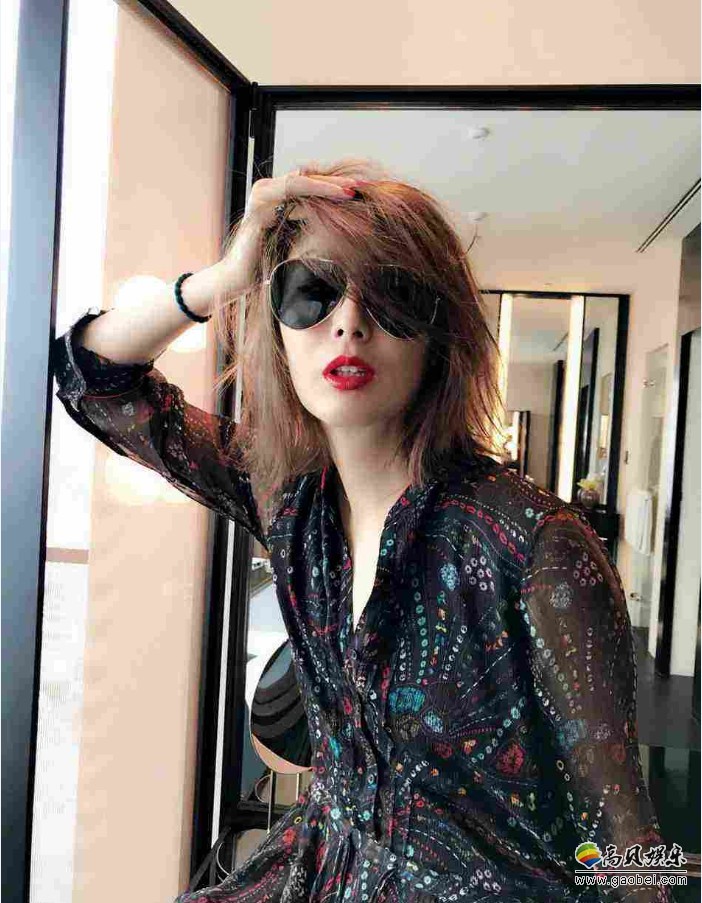 郑秀文上海出席酒店开幕遇上暴雨：感叹另类浪漫！女神晒美照气质依旧