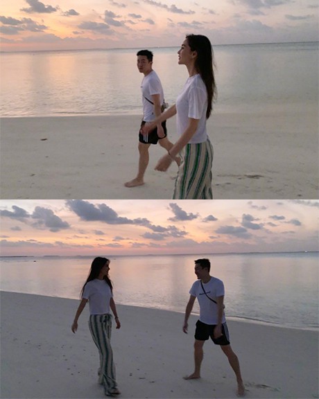 Angelababy晒九宫格短视频：baby与陌生男子海边漫步！应该是她经纪人