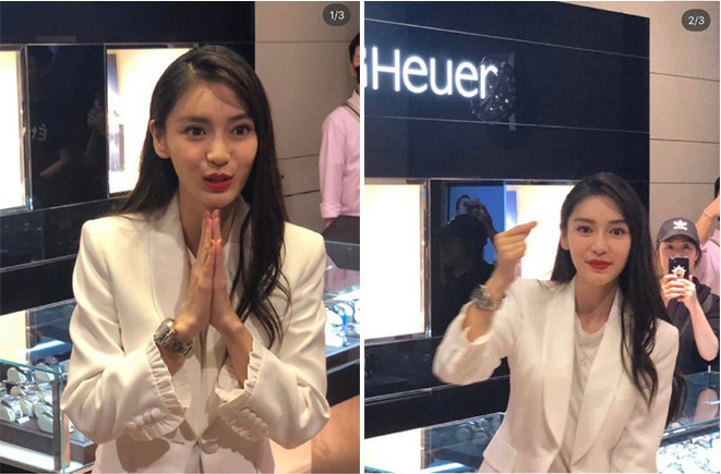 Angelababy现身某活动：身穿白色西装套装，不停对粉丝拱手，比心超暖