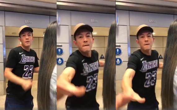 陈冠希和妻子秦舒培现身机场：陈冠希发现有人拍视频！伸手打掉路人手机